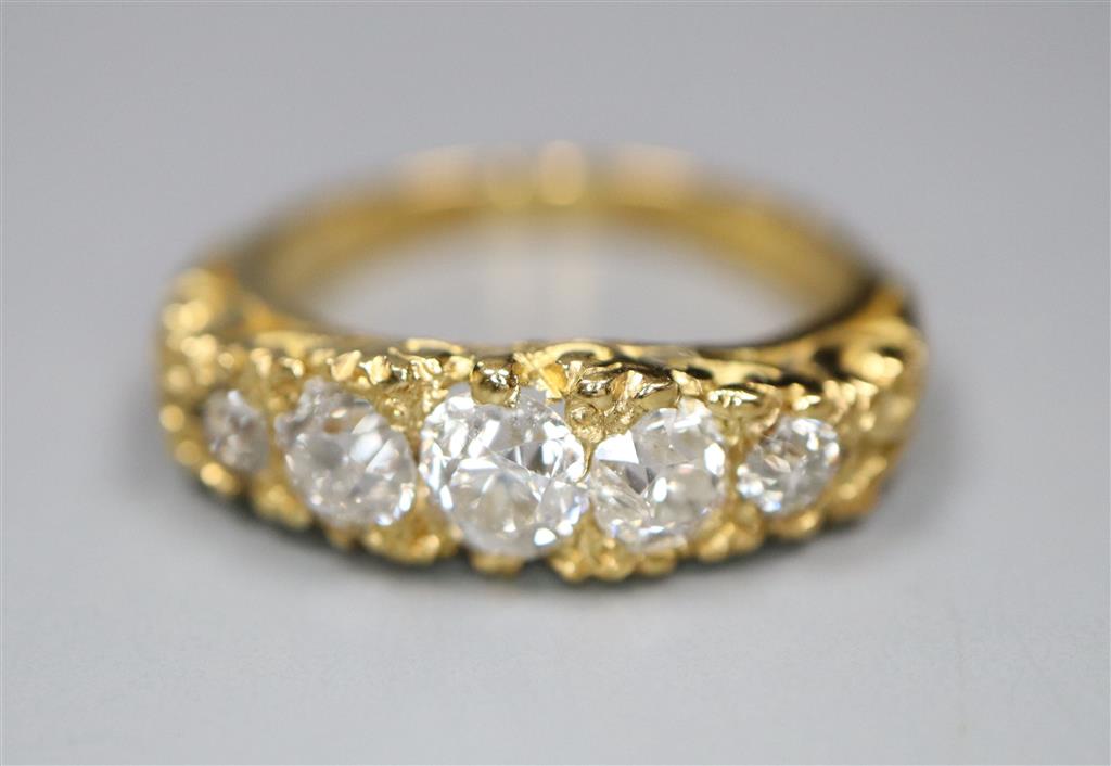 A modern Victorian style 18ct gold and graduated old round cut diamond set half hoop ring,